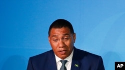 Jamaica's Prime Minister Andrew Holness addresses the Climate Action Summit in the United Nations General Assembly, at U.N. headquarters, Sept. 23, 2019.