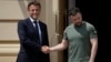 FILE - French President Emmanuel Macron, left, shakes hands with Ukrainian President Volodymyr Zelenskyy at the Mariyinsky Palace in Kyiv, Ukraine, June 16, 2022. France is hosting European leaders for talks on Ukraine Feb. 17, 2025.