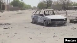 Barnar da Boko Haram tayi wa garin Izghe, Fabrairu 15, 2014.