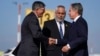 U.S. Secretary of State Antony Blinken, right, is welcomed by U.S. Ambassador to Israel Jack Lew, left, and Israeli Ministry of Foreign Affairs Deputy Director General for North America Lior Hayat in Tel Aviv, Israel, Oct. 22, 2024.