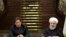 President Hassan Rouhani, right, and Pakistani Prime Minister Imran Khan, attend a joint press briefing, after their meeting at the Saadabad Palace in Tehran, Iran, Monday, April 22, 2019. (Iranian Presidency Office via AP)