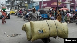 A man carries items on a handmade cart in Goma, North Kivu province, Democratic Republic of the Congo, Feb. 4, 2025.