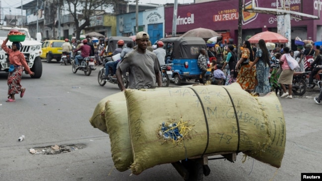 A man carries items on a handmade cart in Goma, North Kivu province, Democratic Republic of the Congo, Feb. 4, 2025.