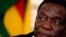 FILE - Zimbabwean President Emmerson Mnangagwa is pictured at a news conference at the State House in Harare, Zimbabwe, Aug. 3, 2018. 