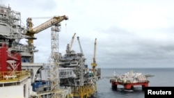 FILE - A view of Equinor's oil platform in Johan Sverdrup oilfield in the North Sea, Norway, Aug. 22, 2018. 