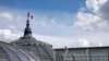 A French flag flying at half-mast at the Grand Palais in Paris, July 28, 2014.