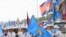 Supporters of the ruling Cambodian People's Party campaign during a commune elections rally in Phnom Penh, Cambodia, Friday, May 18, 2012. The campaign was kicked off Friday for the June 3 commune elections. 