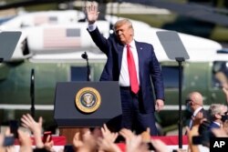 President Donald Trump arrives at a campaign rally, Oct. 19, 2020, in Prescott, Ariz.