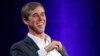 Former Democratic Texas congressman Beto O'Rourke laughs during an interview with Oprah Winfrey on a Times Square stage at "SuperSoul Conversations," Feb. 5, 2019, in New York. O'Rourke dazzled Democrats in 2018 by nearly defeating Republican Sen. Ted Cruz.