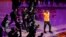 Los Angeles Lakers forward Kobe Bryant waves to the crowd during a ceremony before Bryant's last NBA basketball game, against the Utah Jazz in Los Angeles, April 13, 2016.