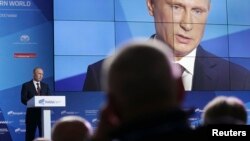 Russian President Vladimir Putin speaks during a meeting in the town of Valdai, Novgorod region, Russia, September 19, 2013.