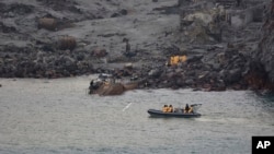 This photo released by the New Zealand Defence Force shows an operation to recover bodies from White Island after a volcanic eruption in Whakatane, New Zealand, Dec. 13, 2019.