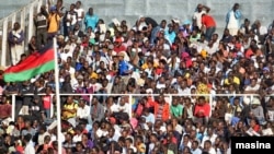 FILE - Many people in Malawi are expected to throng Kamuzu Stadium this week end for soccer matches following an injunction against social gathering restriction. (Lameck Masina/VOA)