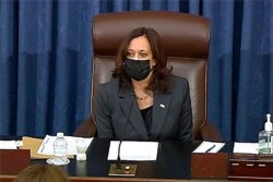 FILE - In this image from Senate TV, Vice President Kamala Harris sits in the chair on the Senate floor to cast the tie-breaking vote, her first, at the Capitol in Washington, Feb. 5, 2021.