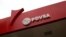 FILE - The corporate logo of the state oil company PDVSA is seen at a gas station in Caracas, Venezuela, March 22, 2017. 