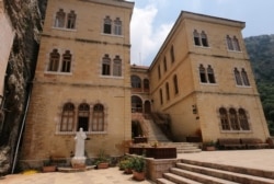 FILE - The Monastery of Saint Anthony of Qozhaya sits in the heart of the Qadisha valley, in Zgharta district, Lebanon, June 23, 2019.