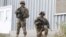 U.S. soldiers stand guard in Qalat, Zabul province, Afghanistan, November 28, 2012.