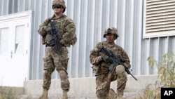 US soldiers stand guard in Qalat, Zabul province, Afghanistan, November 28, 2012.