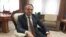 FILE - Moldovan Parliament speaker Andrian Candu poses for a picture during an interview in Chisinau, Moldova, June 5, 2017. 