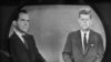 Vice President Richard M. Nixon (l) listens as Senator John F. Kennedy talks during their televised presidential race debate,Oct. 21, 1960. 