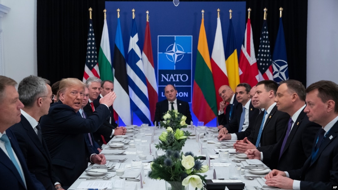 FILE - President Donald Trump speaks during a working lunch with leaders of NATO members countries that have met their financial commitments to the the organization, in Watford, England, Dec. 4, 2019.