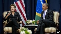 La presidenta Dilma Rousseff y el mandatario estadounidense Barack Obama en su reunión bilateral en Panamá.