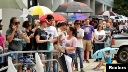 Hundreds of community members line up outside a clinic to donate blood after an early-morning shooting at a gay nightclub in Orlando, Florida, June 12, 2016. 