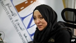 Syrian-American Rania Kisar, seen in this March 13, 2017 file photo, talks to The Associated Press in Istanbul, Turkey. Running a school in the Idlib province in northwest Syria, controlled by Syria’s al-Qaida affiliate, Kisar has become skilled in getting her way, either by negotiating with the militants or by pushing back against them. 