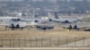 FILE - A Turkish Air Force F-16 fighter jet ( C foreground) is seen between U.S. Air Force A-10 Thunderbolt II fighter jets at Incirlik airbase in the southern city of Adana, Turkey, Dec. 11, 2015. 