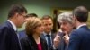 EU Commissioner for Internal Market Thierry Breton, second right, speaks with EU for Crisis Management Janez Lenarcic, left, and EU Commissioner for Health Stella Kyriakides, meeting in Brussels, March 6, 2020. 