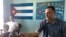 FILE - Jose Daniel Ferrer (R), who leads the Patriotic Union of Cuba (UNPACU), the country's largest dissident group, sits at UNPACU's headquarter in Santiago de Cuba, Dec. 2, 2016. 