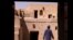 FILE —A man walks in Bahla Fort, one of four historical forts located at the foot of the Green Mountain highlands in Oman, and the only fort in the country designated a UNESCO Heritage Site, in Bahla, 200km north of Muscat, on October 5, 2023.