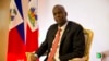 FILE - Haiti's President Jovenel Moise pauses during an interview in his office in Port-au-Prince, Haiti, Aug. 28, 2019. 