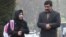 Malala Yousufzai walks with her father Ziauddin as she attends Edgbaston High School for girls in Edgbaston, England March 19, 2013