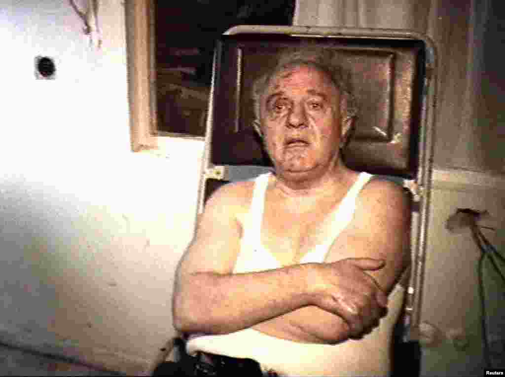 Georgian leader Eduard Shevardnadze is seen in this television picture with cuts and bruises after escaping an apparent assassination attempt August 29, 1995. 
