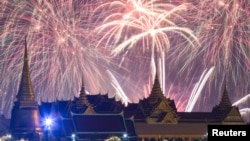 Fireworks explode over the Grand Palace during the New Year celebrations, in Bangkok, Thailand, Jan. 1, 2024.