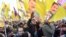 Pro-Kurdish demonstrators protest against Turkish President Recep Tayyip Erdogan and the political repression that followed July's failed military coup,  in Cologne, Germany, Nov. 12, 2016.