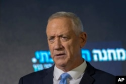 FILE - Benny Gantz speaks at the announcement of former IDF chief Gadi Eisenkot's election bid in Ramat Gan, Israel, August 14, 2022.