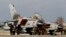FILE - Tornado fighter jets planes of the reconnaissance squadron 51 "Immelmann" stand on the runway upon arrival at Schleswig airbase in Jagel, near the German-Danish border.
