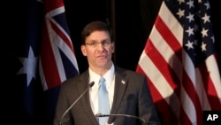 U.S. Defense Secretary Mark Esper briefs the media at a press conference following annual bilateral ministerial talks in Sydney, Australia, Aug. 4, 2019. 