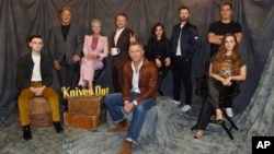 Actors gather for a photo shoot during the original Knives Out. A follow-up is coming soon and expected to be one of the biggest movies of the autumn movie season. (Photo by Jordan Strauss/Invision/AP)