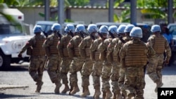 FILE - Chile's Army, part of the United Nations Stabilization Mission in Haiti (MINUSTAH) march in Cap-Haitien, Jan. 24, 2015.