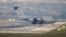 A United States Air Force cargo plane maneuvers on the runway after it landed at the Incirlik Air Base, on the outskirts of the city of Adana, southern Turkey, July 31, 2015.