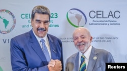 Nicolás Maduro, Presidente da Venezuela (esq) e Lula da Silva, Presidente do Brasil (dir), Kingstown, 1 março 2024.