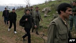 A picture taken on March 13, 2013 shows Turkish prisoners as they were released in the northern Iraqi city of Dohuk, after being held for two years in northern Iraq by the Kurdish Workers' Party (PKK). 