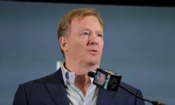FILE - NFL Commissioner Roger Goodell speaks during a news conference in Miami, Feb. 3, 2020.