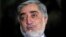 Former Afghan foreign minister Abdullah Abdullah speaks during an interview in Kabul April 13, 2014.