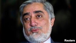 Former Afghan foreign minister Abdullah Abdullah speaks during an interview in Kabul April 13, 2014.