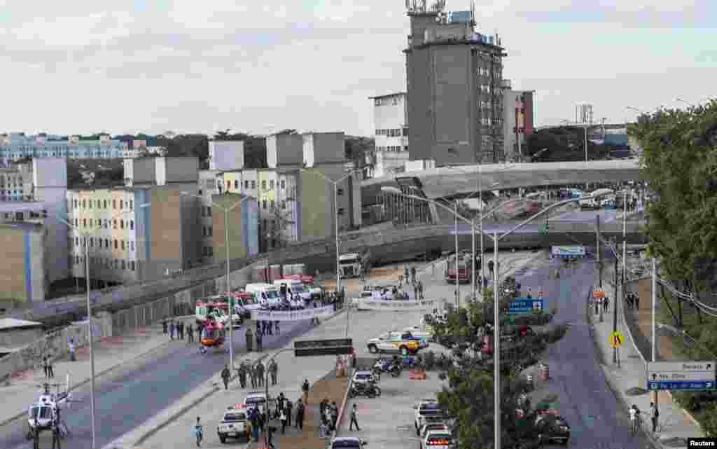 An overview of a bridge that collapsed while under construction trapping vehicles underneath in Belo Horizonte, July 3, 2014.