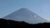 Late Snow on Japan’s Mount Fuji Sets a Record